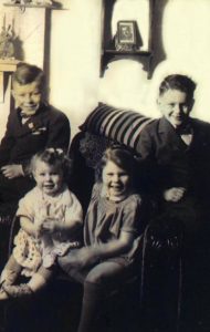 Our mother sent his photo to our father while he served in WW II. His photo is sitting on the shelf on the wall behind the chair.